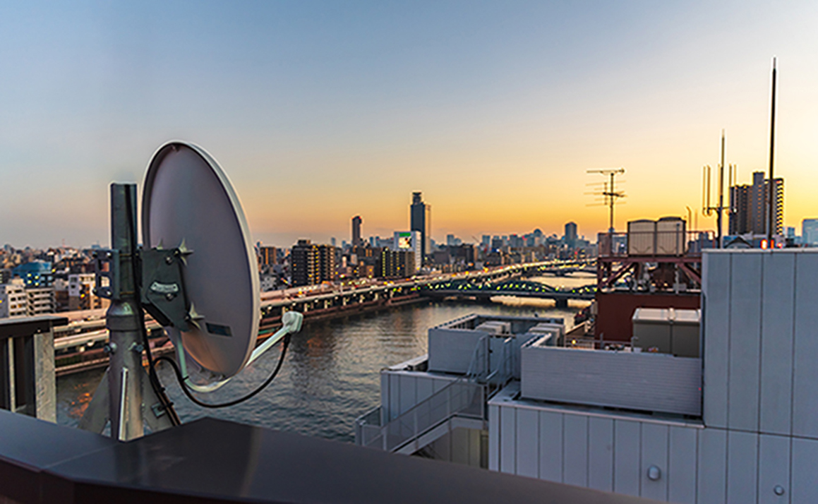 Satellte dish at the top of building